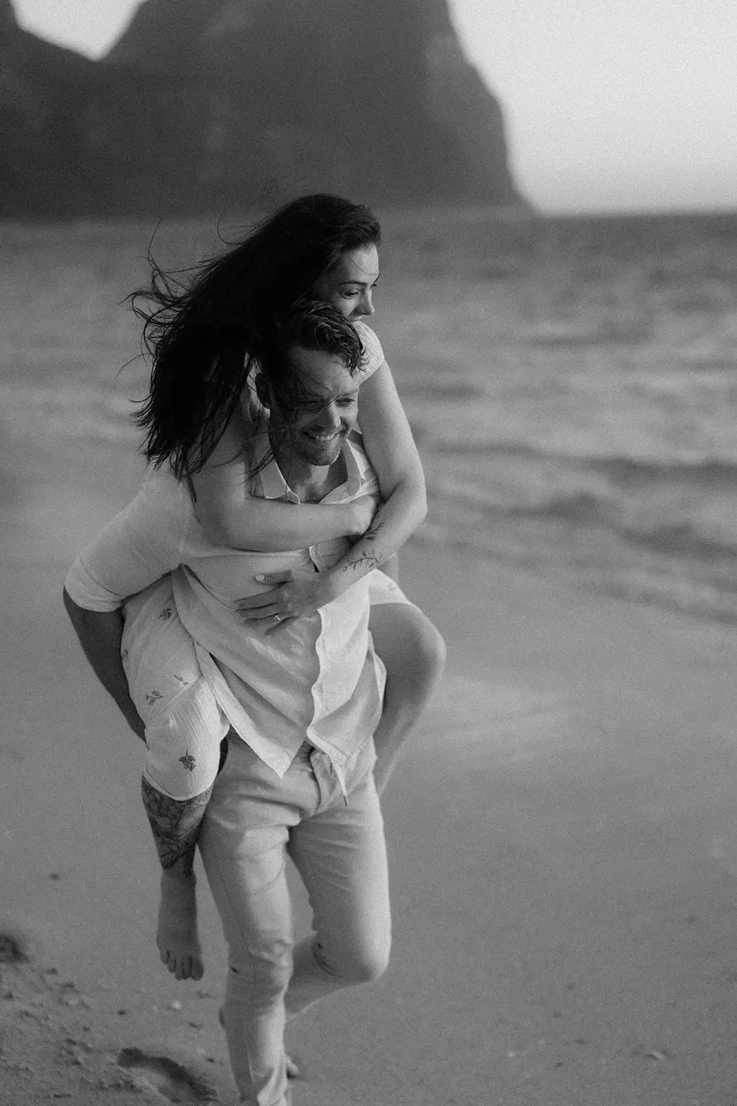 Mel running along the sand, Lord Howe Island