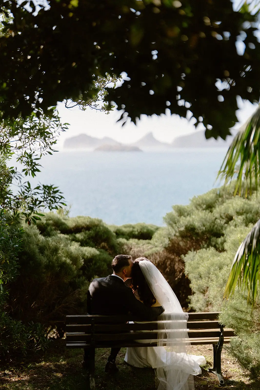 Mel and Brent beside a small waterfall, Lord Howe Island