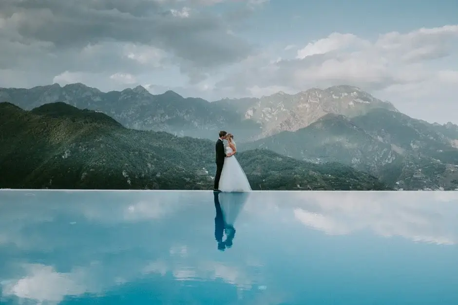 Emilie and Henrik reflected in the infinity pool, Ravello